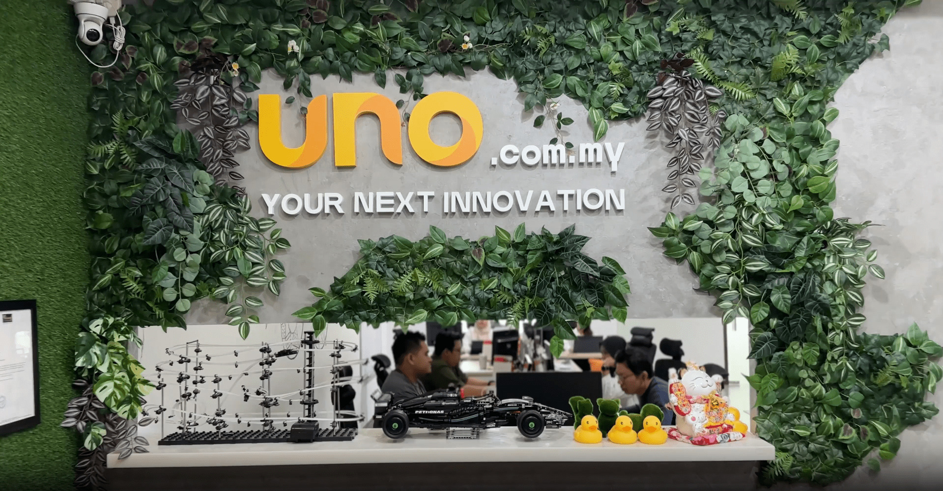 The uno.com.my team at work in the Kuala Lumpur studio